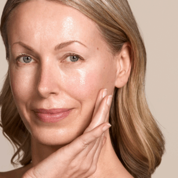 image of the model with zelens face oil on her skin