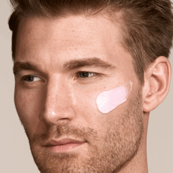 image of male model with zelens spf on his face