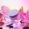 Joonbyrd Violet Haze Body Scrub 200ml jar styled aesthetically on a soft, colorful background, highlighting its exfoliating and nourishing benefits.