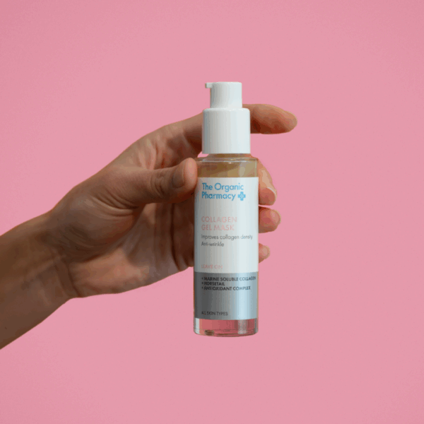 Hand holding The Organic Pharmacy Collagen Gel Mask 50ml – firming and plumping skincare treatment