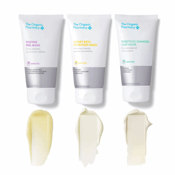 The Organic Pharmacy Enzyme Peel Mask 60ml jar alongside complementary skincare products, formulated to exfoliate and brighten skin gently