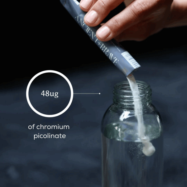 Ancient and Brave True Hydration Sachet partially submerged in water, highlighting 48µg of Chromium Picolinate