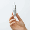 Hand holding Bioeffect EGF Power Serum 15ml bottle, designed to boost skin regeneration, hydration, and reduce signs of ageing.