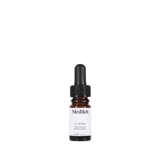 Medik8 C-Tetra 8ml in a small glass bottle with orange label, a vitamin C serum designed to brighten and protect skin.