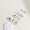 Bioeffect Travel Cleansing Set with compact bottles of cleanser, toner, and moisturizer, perfect for on-the-go skincare.