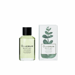 Olverum Bath Oil 125ml – a clear green-tinted botanical bath oil in a sleek glass bottle with a black cap, positioned beside its minimalist box packaging.