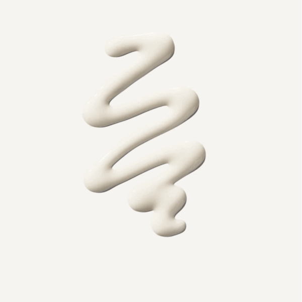 Creamy texture of Olaplex No 5 Fine Bond Maintenance Conditioner displayed on a neutral background