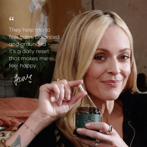 Woman pictured with a testimonial about feeling calm, balanced, and grounded after using Ancient and Brave True Magnesium