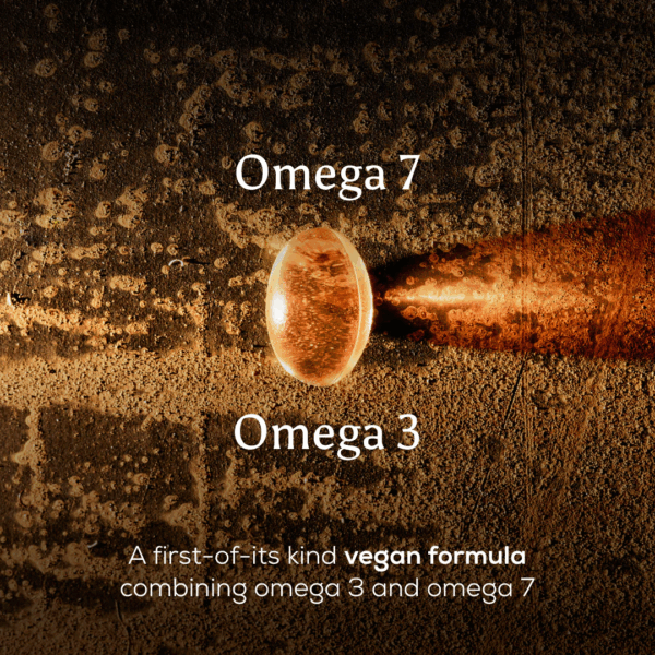 Close-up of Ancient and Brave True Omegas+ capsule highlighting omega 3, omega 7, and first-of-its-kind vegan formula