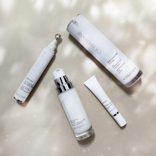 Teoxane RHA Vit C Serum 30ml arranged alongside other Teoxane products on a clean, minimal background, reflecting a complete skincare routine
