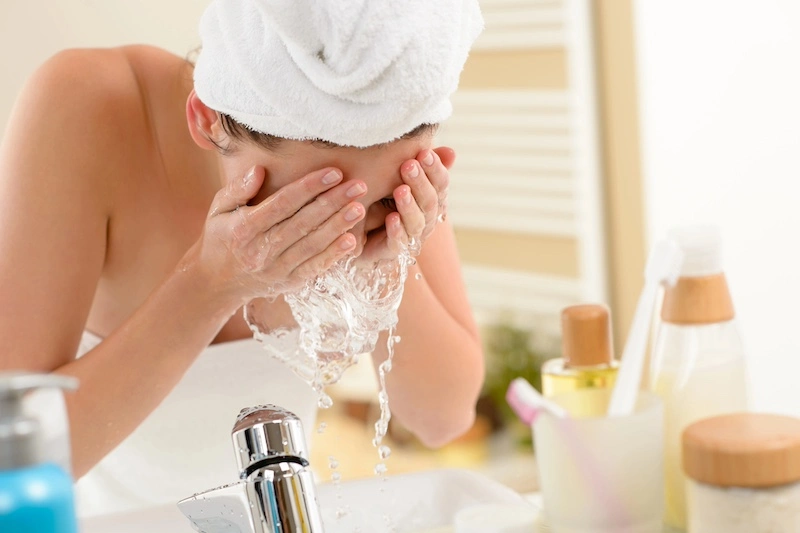 Woman Using a Decree Cleanser
