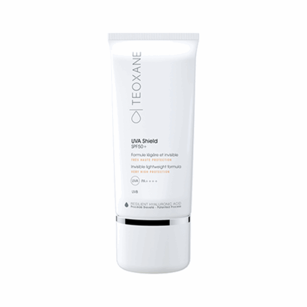 Teoxane Advanced Perfecting Shield SPF 50 in elegant white and silver tube, standing upright on a clean, light background to highlight its sleek design.