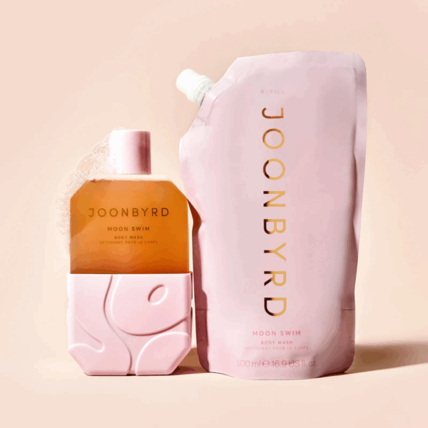 Joonbyrd Moon Swim Body Wash 350ml bottle styled with its packaging on an aesthetic surface, highlighting its nourishing and sensory body care experience.