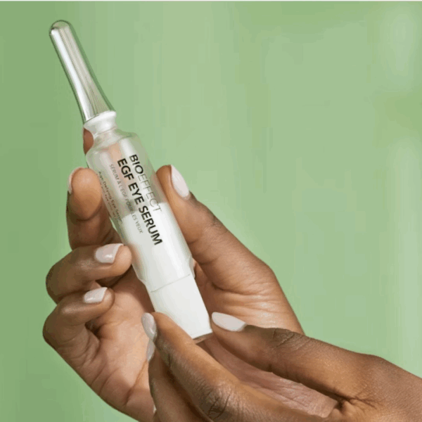 Bioeffect Eye Serum with Refill 2 x 6ml held in hand, designed to reduce puffiness, dark circles, and fine lines around the eyes.