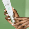 Hand holding Bioeffect EGF Hand Serum 40ml, formulated to hydrate, repair, and rejuvenate the skin on hands.